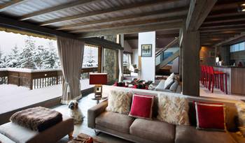 Interior design of studio in country house in Chalet style.