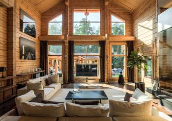 Modern Wooden Chalet: Harmony of Natural Light and Organic Textures