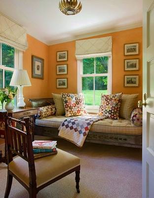 Cozy Window Nook in Peach Tones: Traditional Interior with Modern Accents