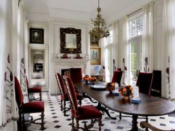 Beautiful design of dining room in house in empire style.