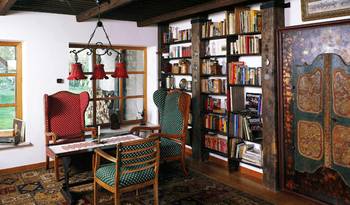 Design of home office in country house in ethnic style.