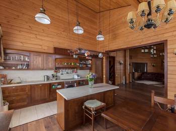 Wooden Harmony: Cozy Country House Interior with Open Floor Plan