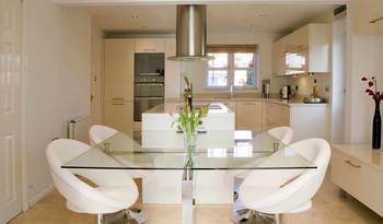 Minimalist Kitchen-Dining Space: Light Harmony of Functionality