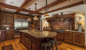 Photo of kitchen in country house in Chalet style.