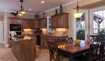 Option of kitchen in private house in colonial style.