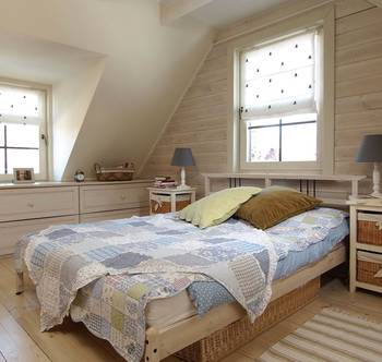 Beautiful design of attic in country house in scandinavian style.