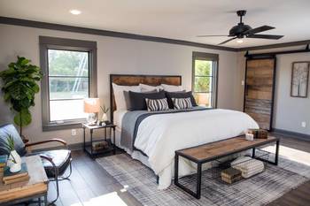 Modern Bedroom with Rustic Accents: The Harmony of Wood and Metal in Country House Interior