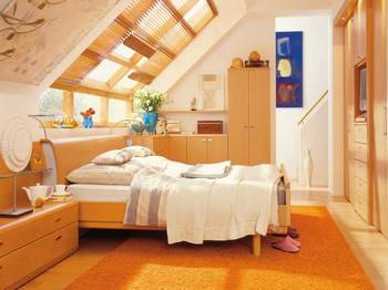 Interior design of attic in cottage in contemporary style.