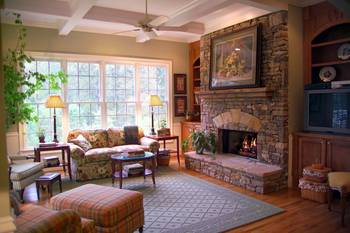 Cozy Country Style Living Room with Stone Fireplace and Natural Elements
