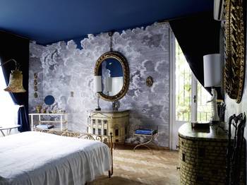Bedroom in country house in empire style.