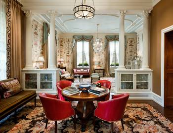 Neoclassical Interior with Corinthian Columns and Vibrant Color Accents