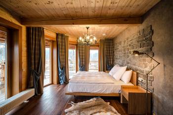 Beautiful interior of bedroom in country house.