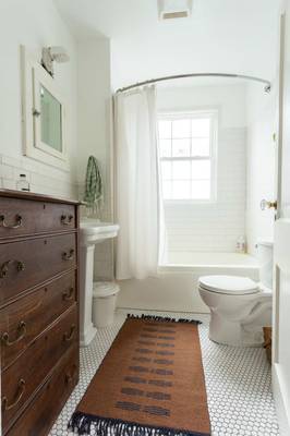Beautiful design of bathroom in cottage in Craftsman style.