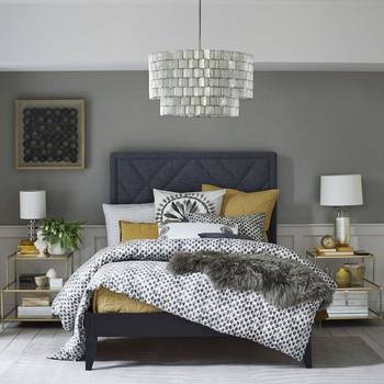 Modern bedroom with refined accents: gray-blue palette with mustard notes