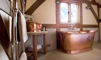 Beautiful design of bathroom in cottage in colonial style.