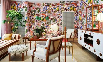Eclectic Living Room with Bold Floral Accent: Mid-Century Modern Design Statement