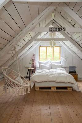 Cozy Attic: Scandinavian Minimalism with Bohemian Accents