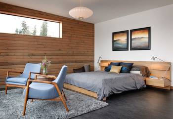 Modern bedroom with wooden accent wall: minimalism and natural harmony