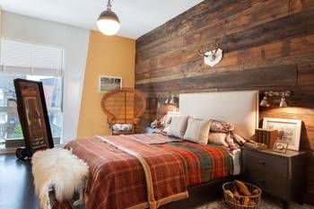 Cozy Bedroom with Rustic Accent Wall: A Modern Interpretation of Country Style