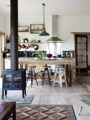 Kitchen interior in cottage in ethnic style.