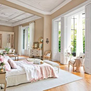 Classical Elegance: Spacious Bedroom with French Windows in Beige Tones