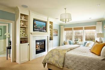 Harmonious Bedroom with Fireplace: Balance of Functionality and Elegance in Country House Interior