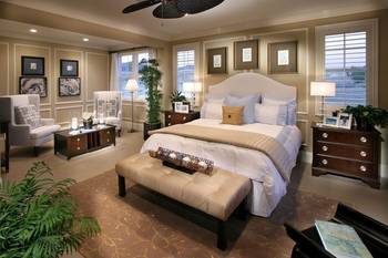Elegant bedroom in classic style with warm color palette