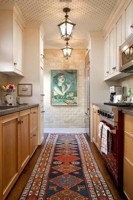 Option of kitchen in cottage in ethnic style.