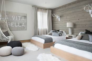 Modern Scandinavian bedroom with wooden accent wall and neutral palette