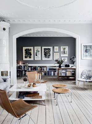 Scandinavian Elegance: Contrasting Interior with Classical Details and Arched Zoning