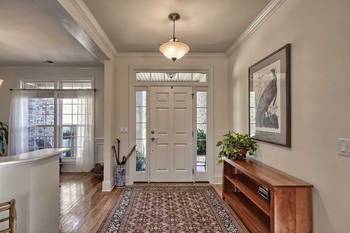 Classic American Entryway: Harmony of Light and Traditional Details
