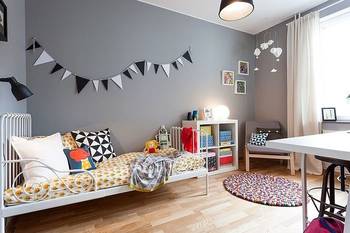 Scandinavian Minimalism in a Children's Room: Monochrome Palette with Geometric Accents
