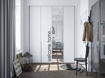 Minimalist entryway with mirrored wardrobe and Scandinavian motifs