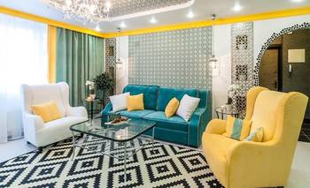 Vibrant Moroccan Mix: Turquoise and Yellow Living Room with Geometric Accents