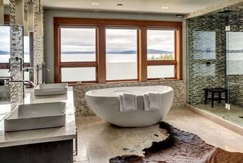 Modern bathroom with panoramic view: harmony of nature and luxury