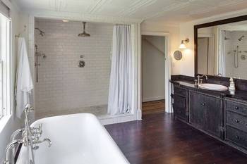 Interior design of bathroom in cottage in colonial style.