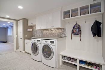 Beautiful design of laundry in house in Craftsman style.