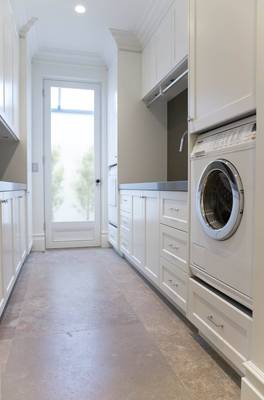 Photo of laundry in cottage in contemporary style.