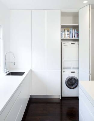 Photo of laundry in house in contemporary style.