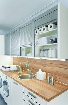 Laundry example in cottage in contemporary style.