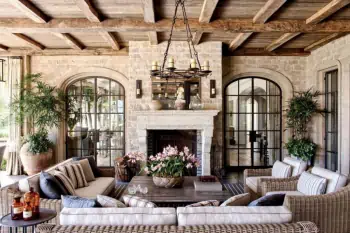 Tuscan Elegance: Mediterranean Interior with Stone Walls and Arched Doorways