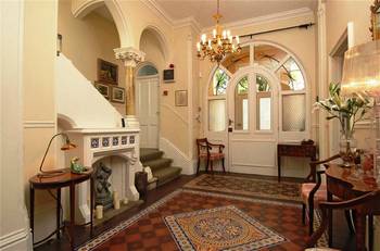 Photo of hallway in country house in colonial style.