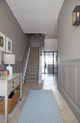 Photo of stairs in country house in contemporary style.