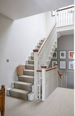 Photo of stairs in house in Craftsman style.