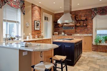 Beautiful design of kitchen in country house in Craftsman style.