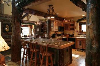 Beautiful design of kitchen in cottage in Chalet style.