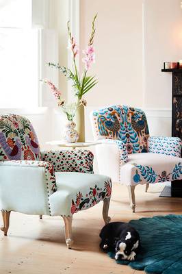Eclectic country house interior with vibrant ethnic accents