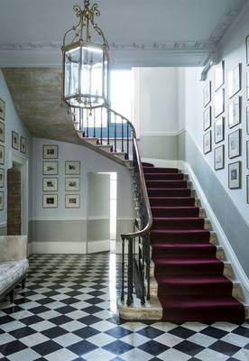 Photo of stairs in country house in empire style.