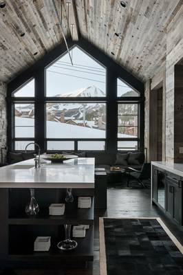 Interior design of kitchen in house in Chalet style.