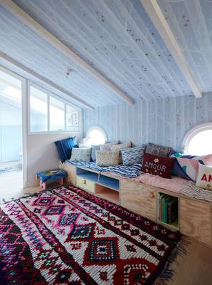 Attic interior in private house in Mediterranean style.